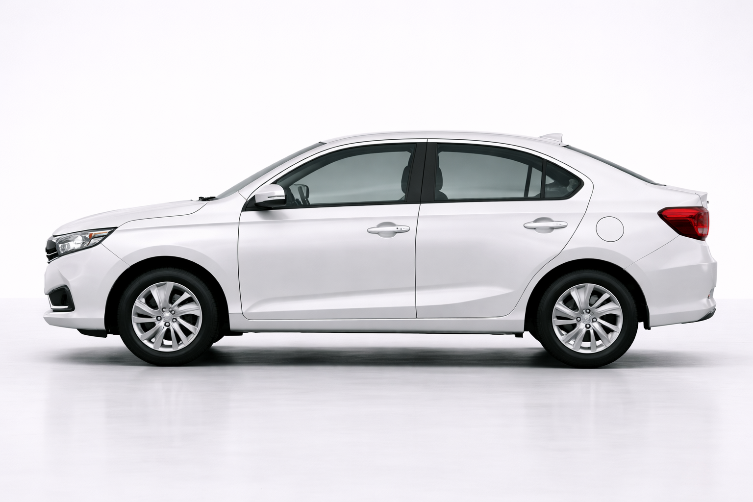 Hyundai Amaze side view showcasing its smooth body lines, balanced proportions, and modern compact sedan profile.