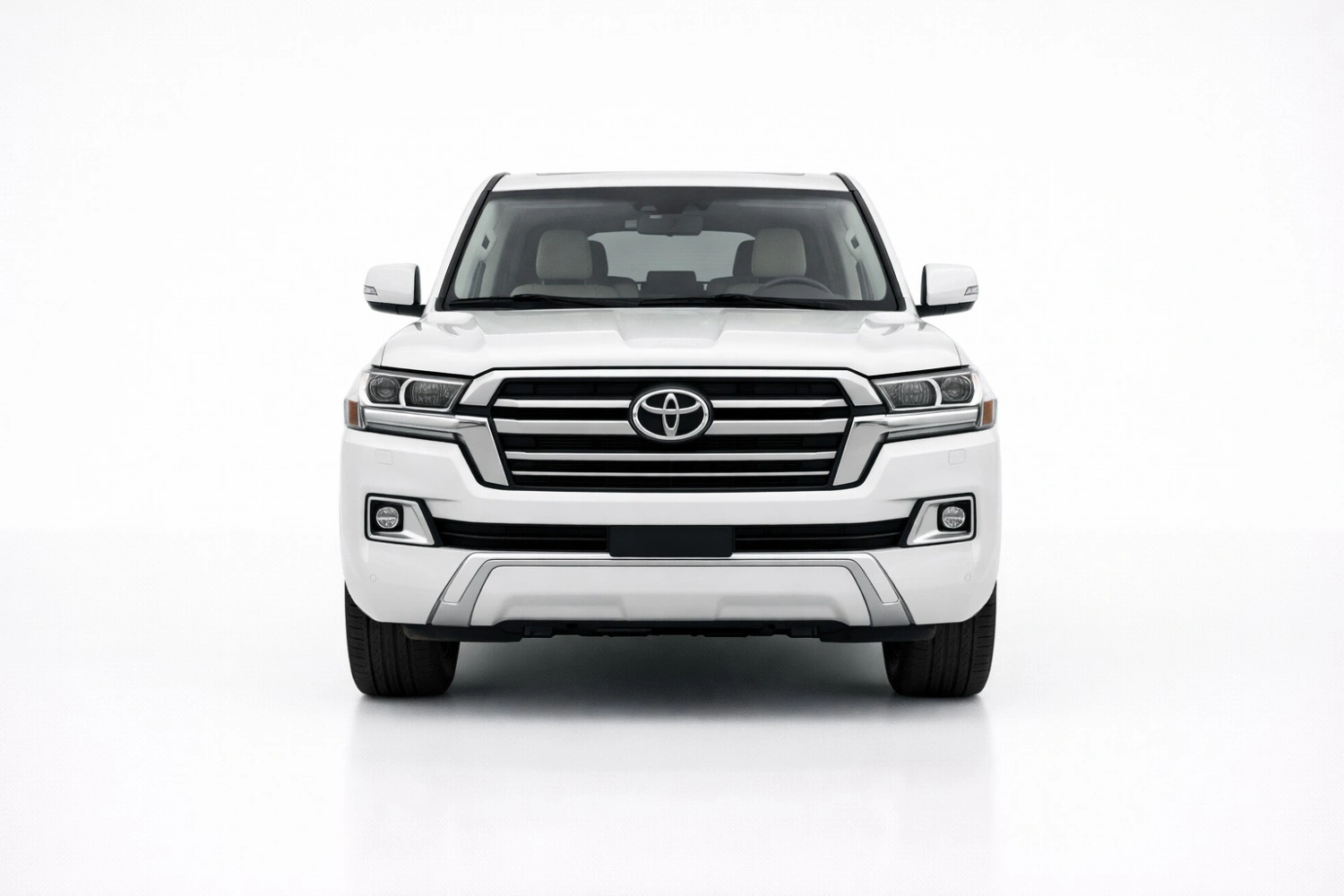 Toyota Land Cruiser V8 front view showing bold grille, LED headlights, and commanding SUV stance