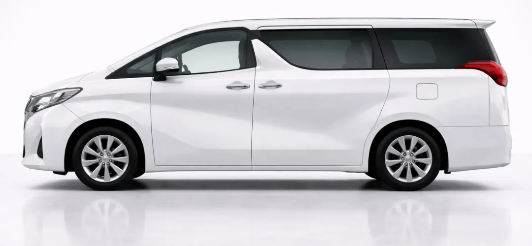 Toyota Alphard side profile displaying long luxury MPV proportions and refined silhouette